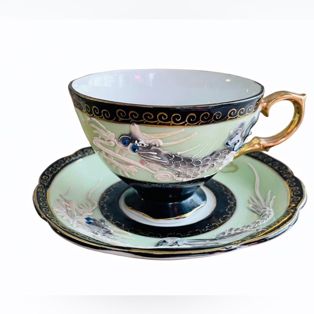 Elegant Dragon Motif Teacup and Saucer Set